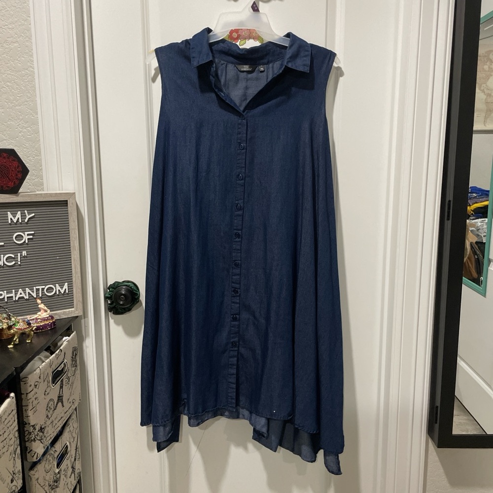 Navy blue sleeveless button-up shirt dress